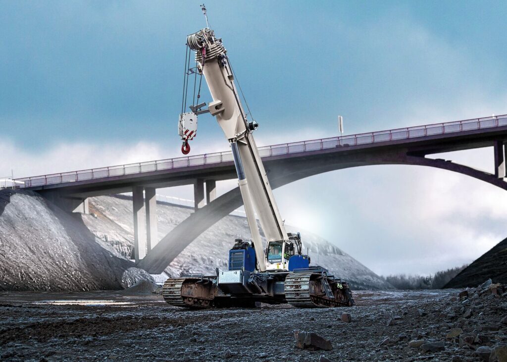 Гусеничні крани з телескопічною стрілою